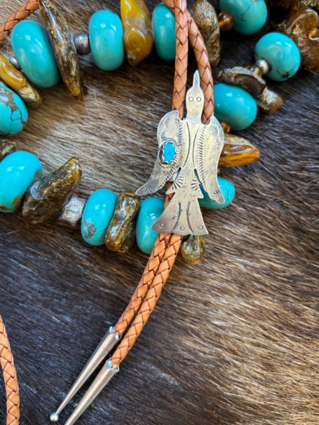 Vintage waterbird, sterling silver with turquoise bolo. New leather cord and tips.Hallmarked HIJE