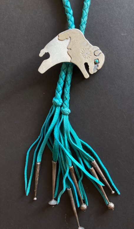 Deerskin bolo tie with sterling silver Buffalo