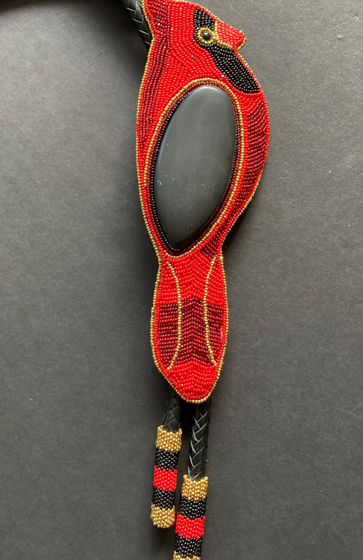 Custom beaded cardinal bolo